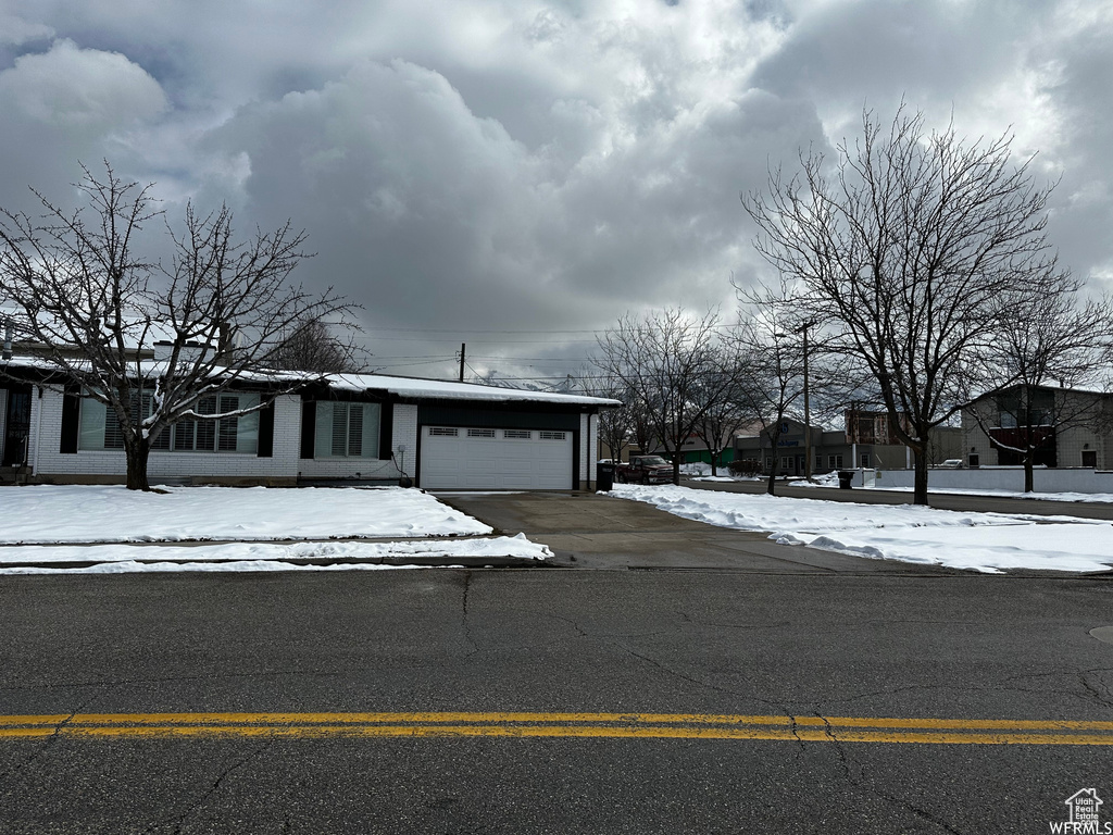 View of front of property with a garage