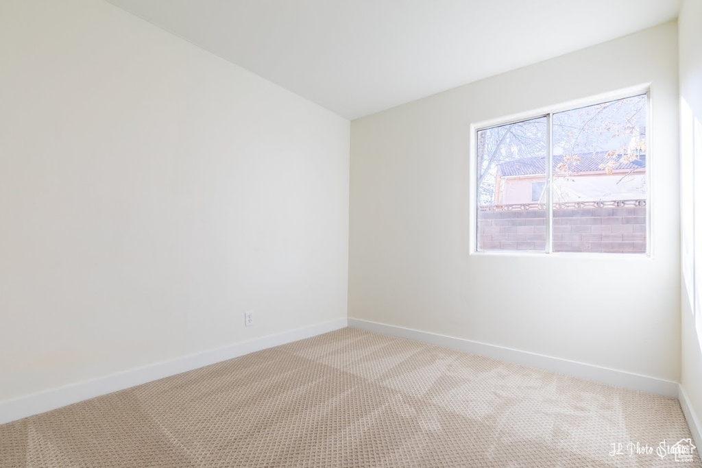 View of carpeted spare room
