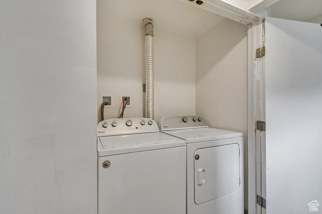 Washroom with separate washer and dryer and washer hookup