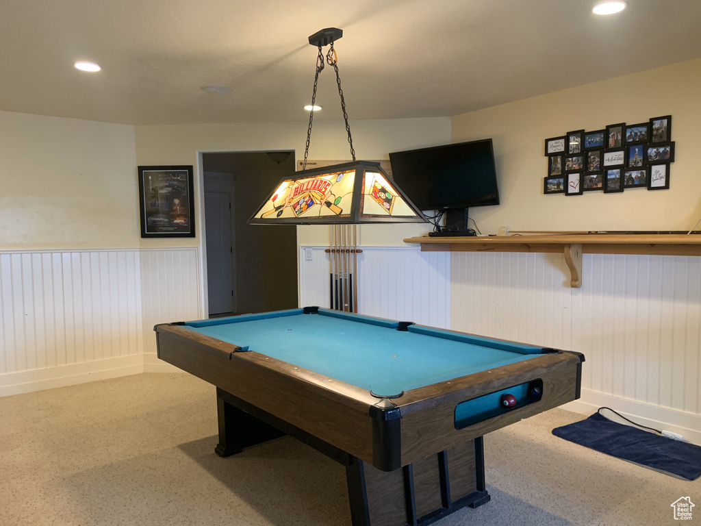 Game room with pool table and light carpet