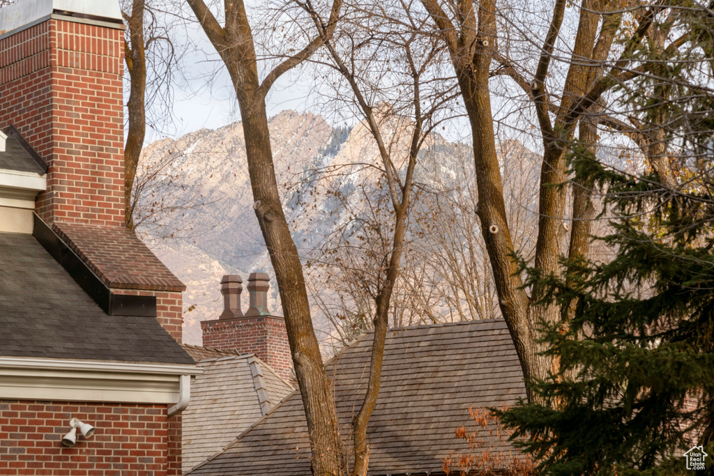 View of side of property featuring a mountain view
