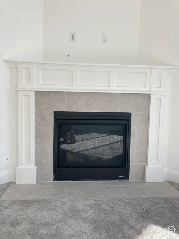 Details with a tile fireplace