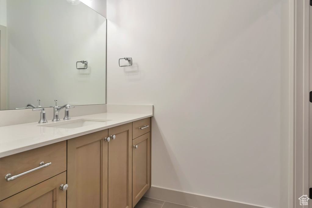 Bathroom with tile floors and vanity