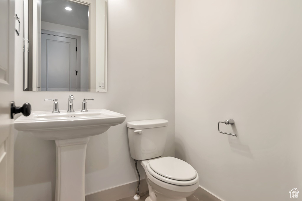 Bathroom with sink and toilet