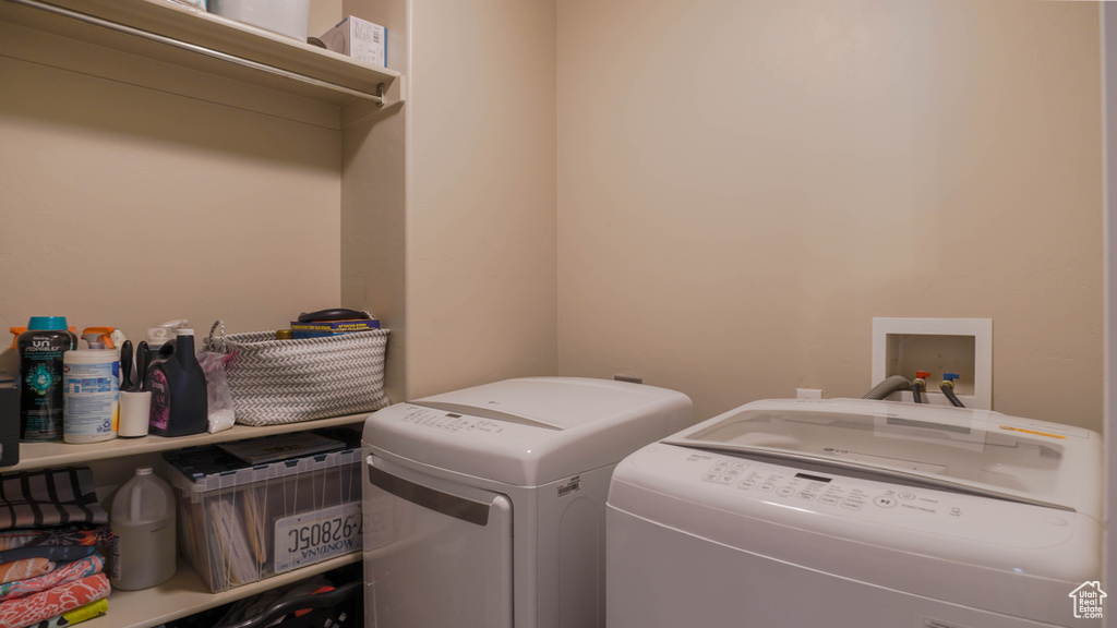 Clothes washing area with washer and clothes dryer