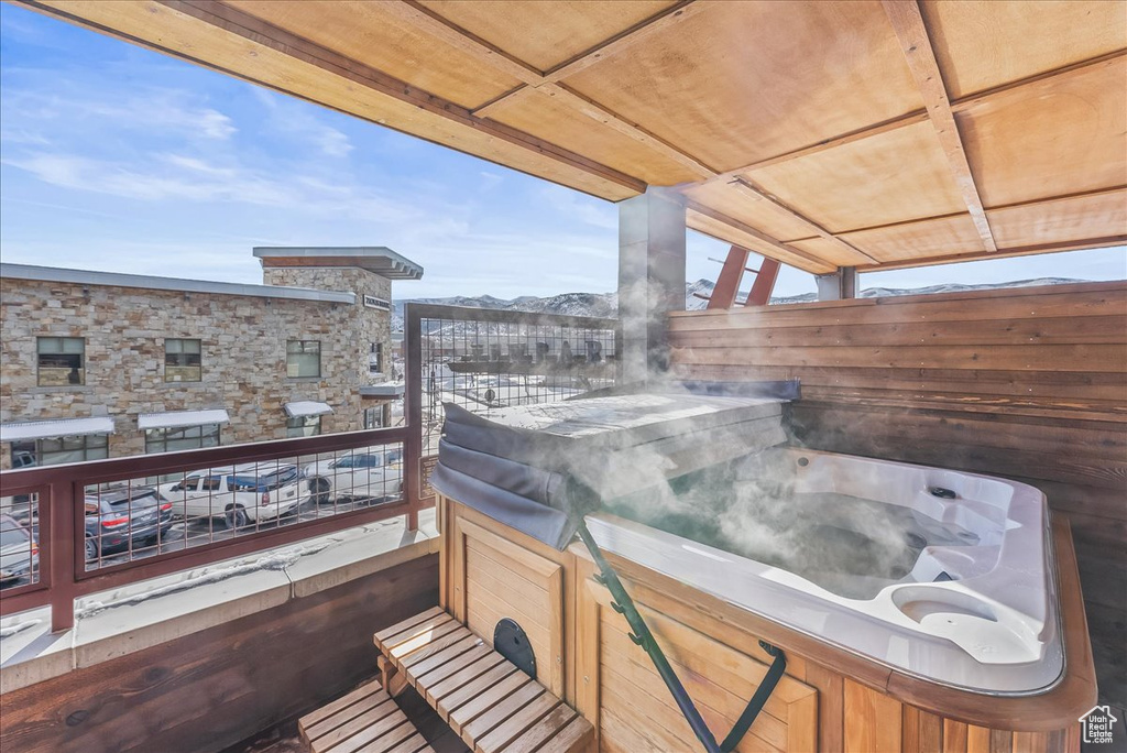 Balcony featuring a hot tub