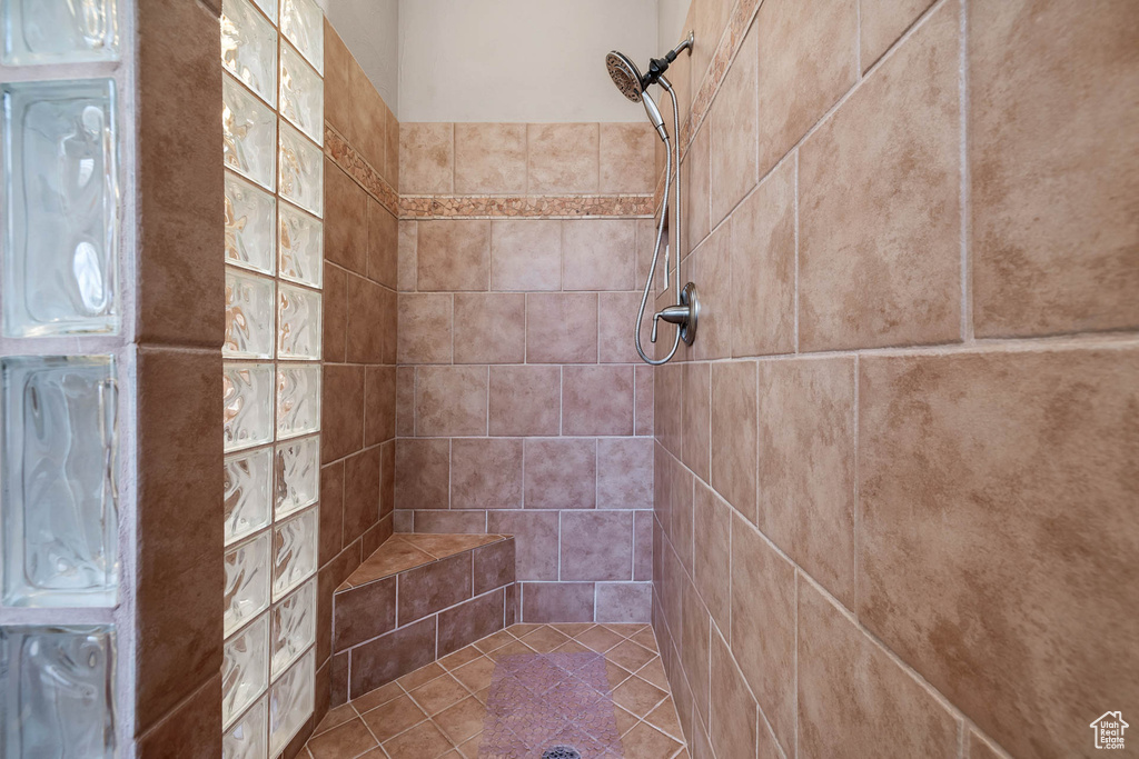 Bathroom with a tile shower