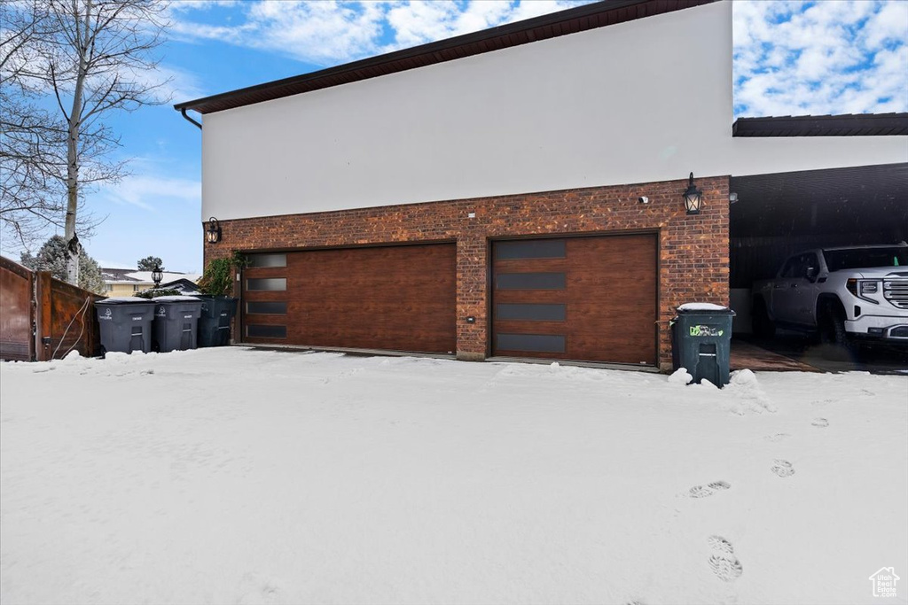 Exterior space featuring a garage