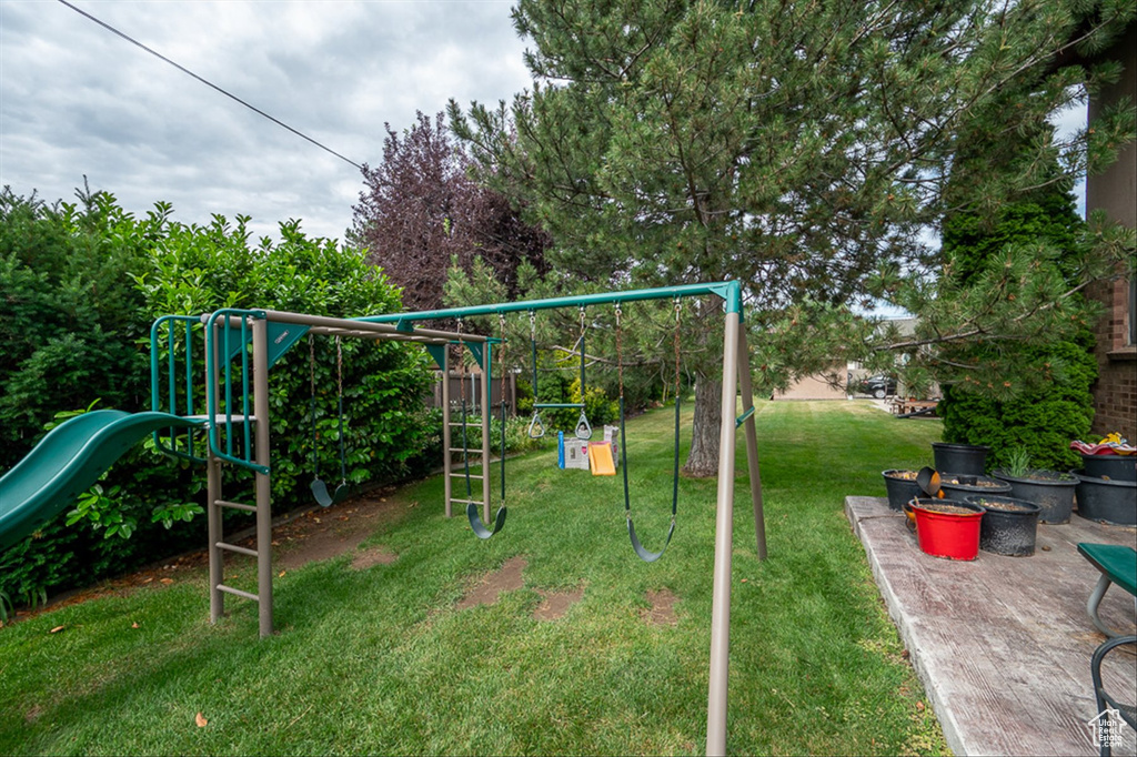 View of yard featuring a playground
