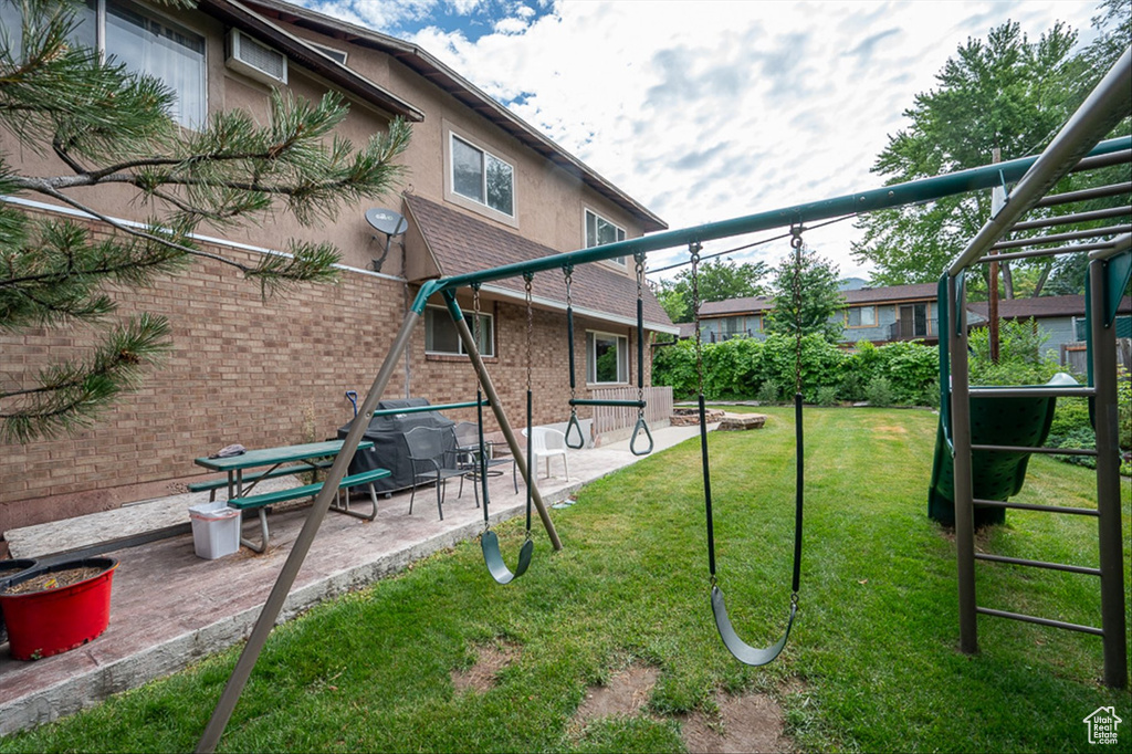 View of yard with a patio area