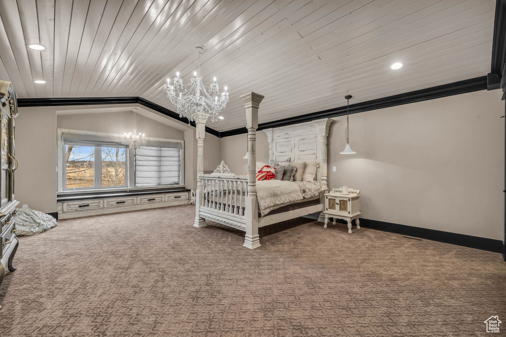 Bedroom featuring crown molding, vaulted ceiling, dark carpet, and a notable chandelier