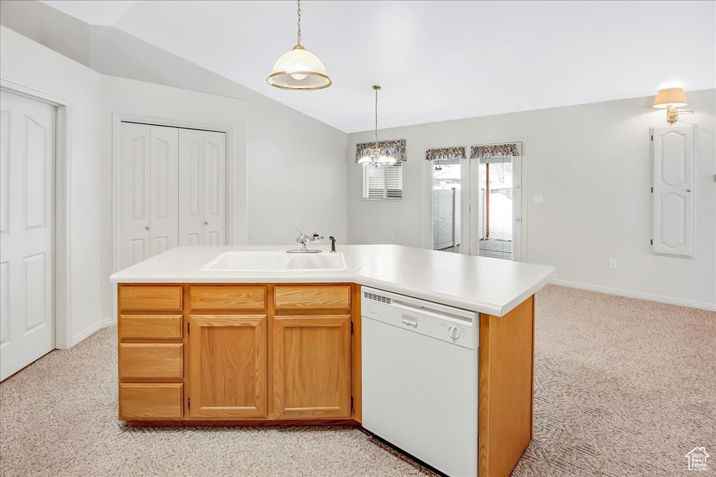 Kitchen featuring decorative light fixtures, light carpet, white dishwasher, lofted ceiling, and sink