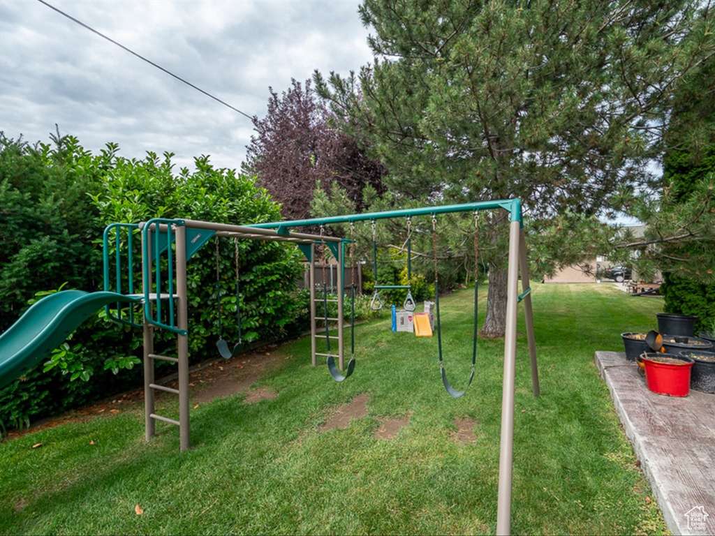 View of yard featuring a playground