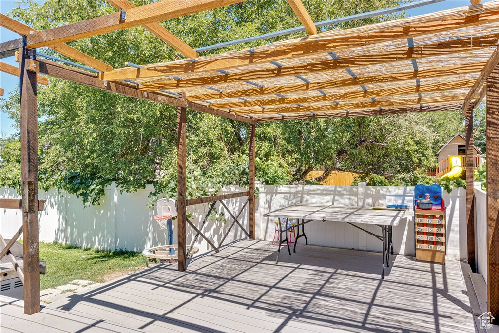 View of patio / terrace with a pergola and a deck