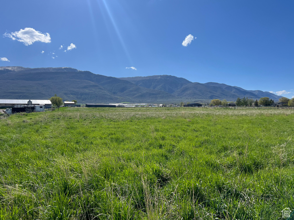 Property view of mountains featuring a rural view