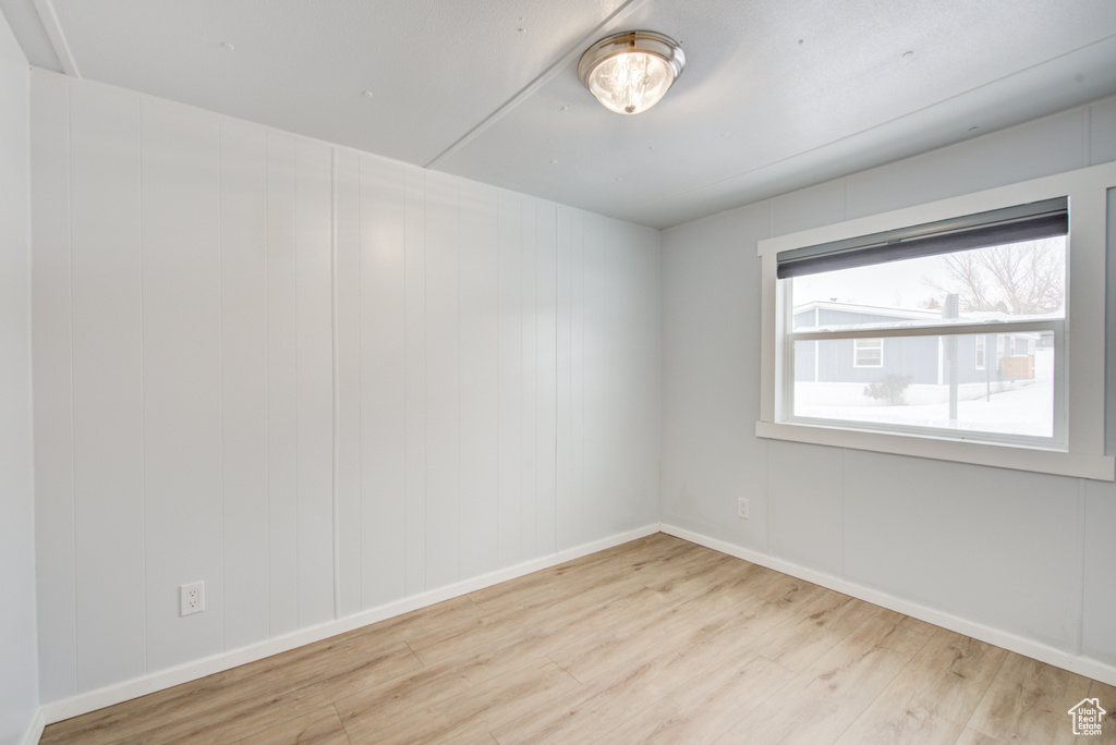 Unfurnished room featuring light hardwood / wood-style flooring