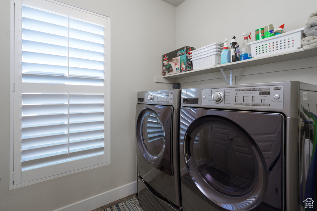 Clothes washing area with washing machine and clothes dryer