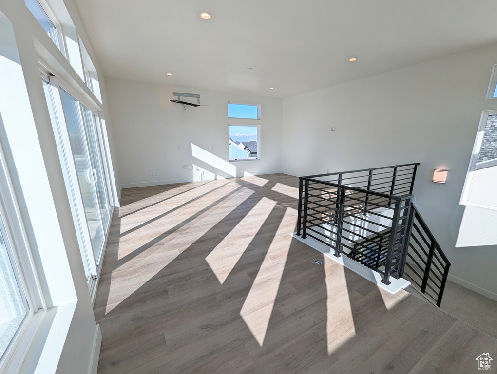 Stairway with light wood-type flooring