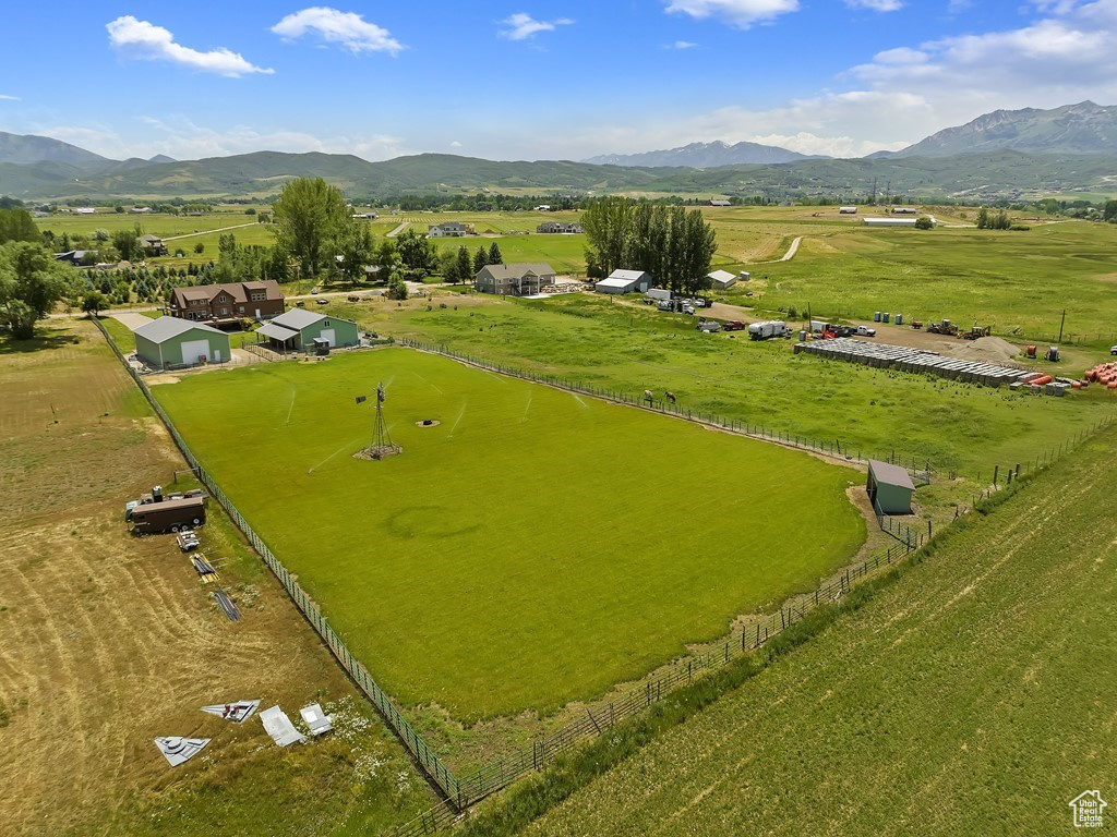 Birds eye view of property with a rural view and a mountain view