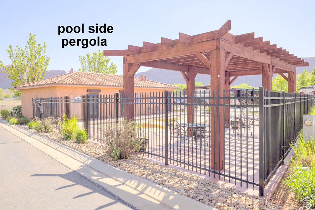 Exterior space with a pergola