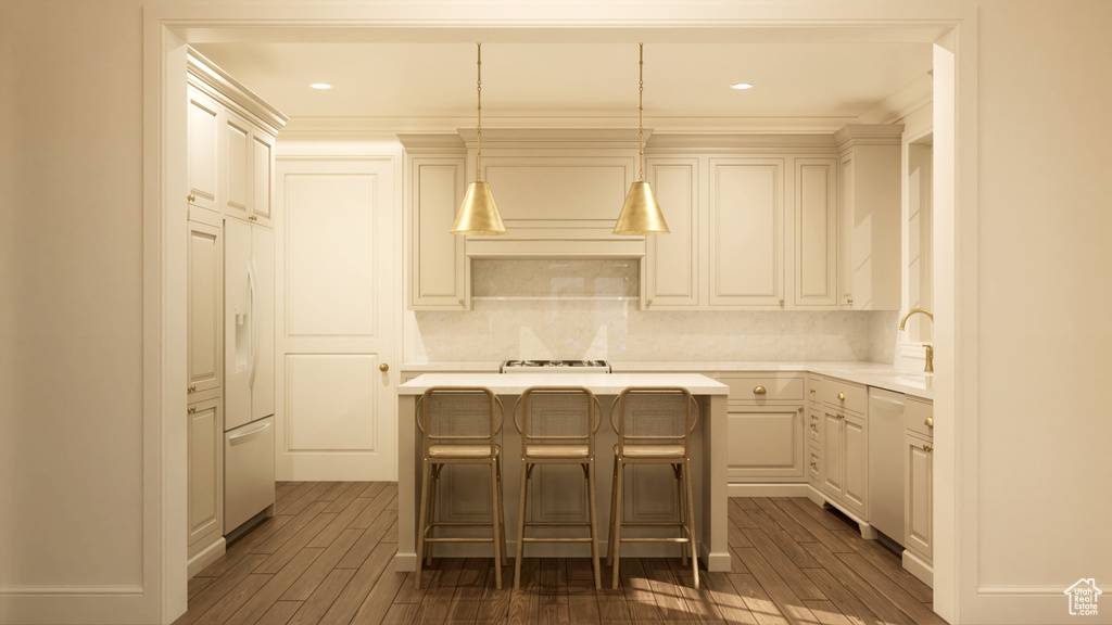 Kitchen featuring pendant lighting, tasteful backsplash, white appliances, and dark wood-type flooring