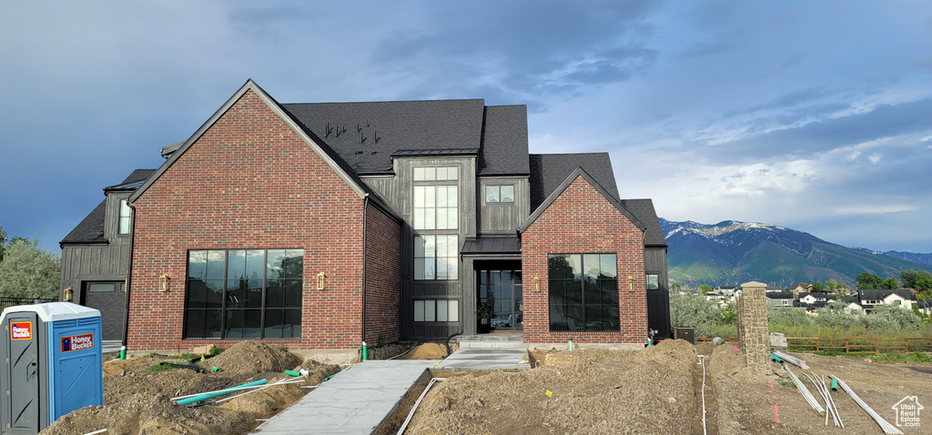 View of front of house featuring a mountain view