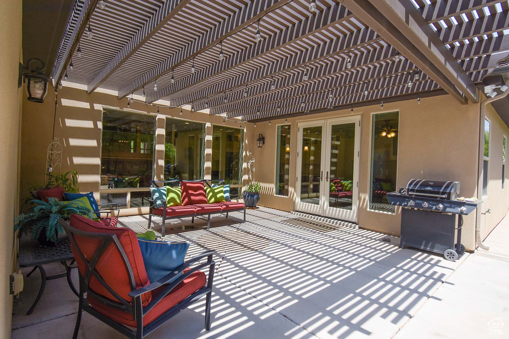 View of patio / terrace with a pergola, a grill, and an outdoor hangout area