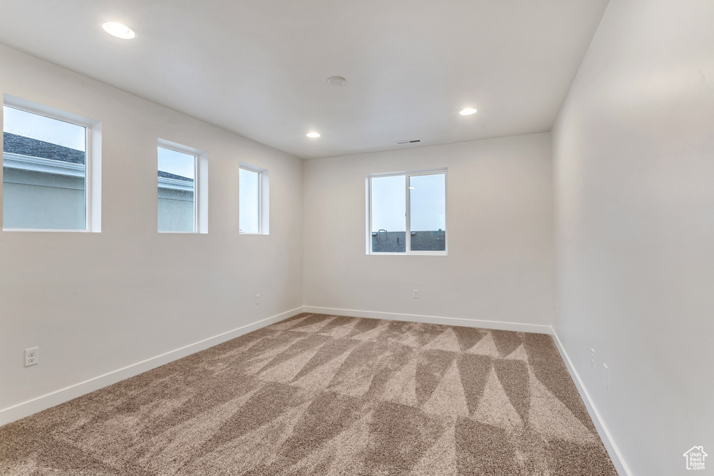 Spare room featuring carpet floors