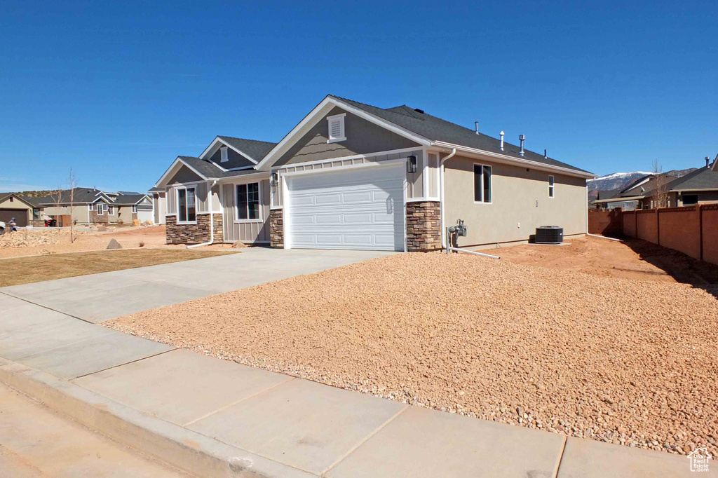 Craftsman inspired home with a garage