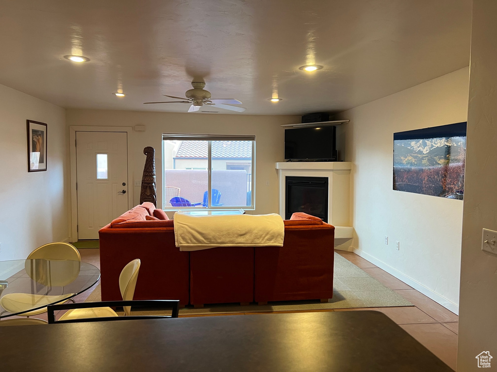 Tiled living room with ceiling fan