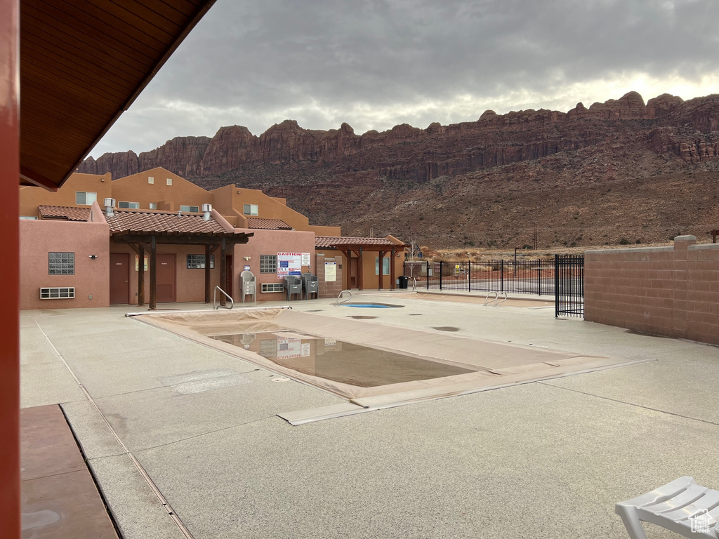 View of pool featuring a mountain view