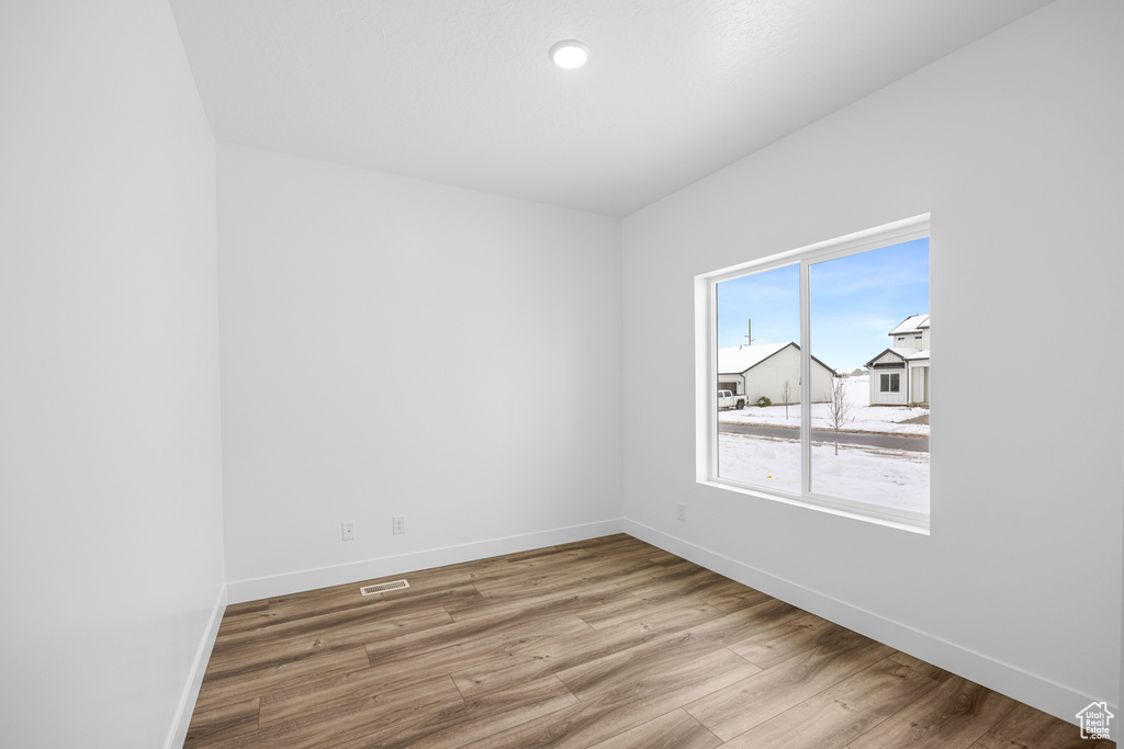 Spare room with light hardwood / wood-style floors