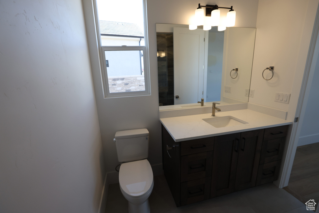 Bathroom with vanity and toilet