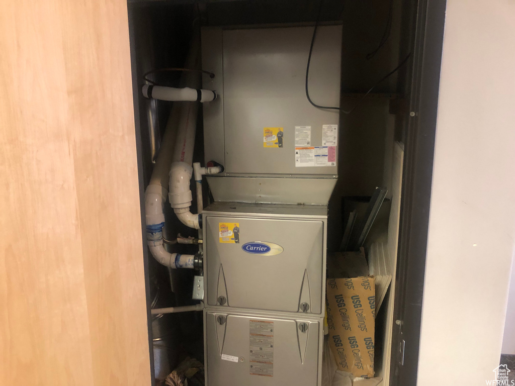 Utility room featuring heating utilities