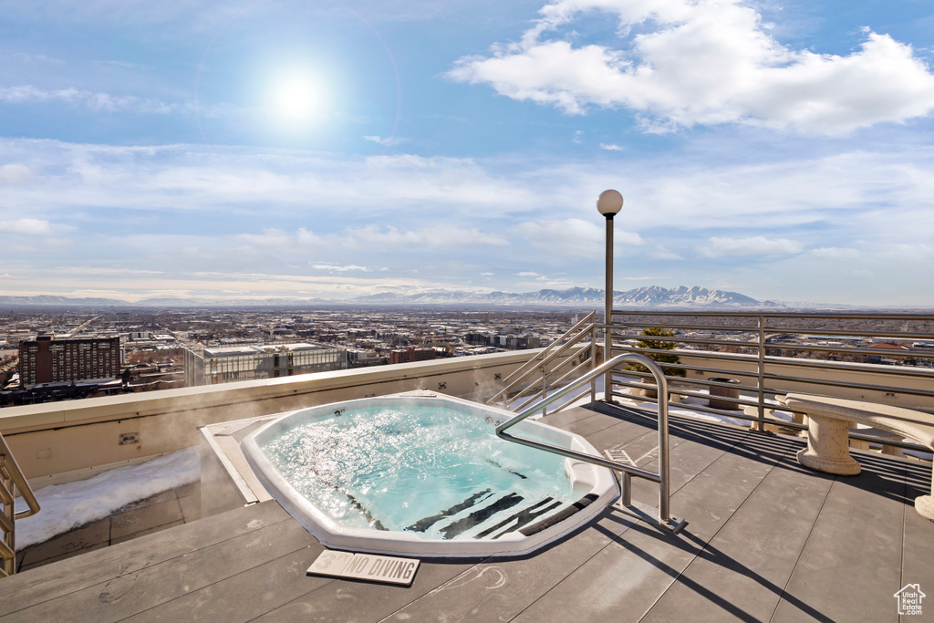 View of pool featuring a mountain view