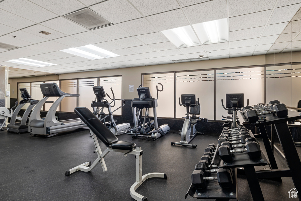 Exercise room featuring a drop ceiling