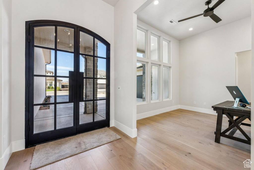 Foyer entrance featuring recessed lighting, baseboards, ceiling fan, and wood finished floors