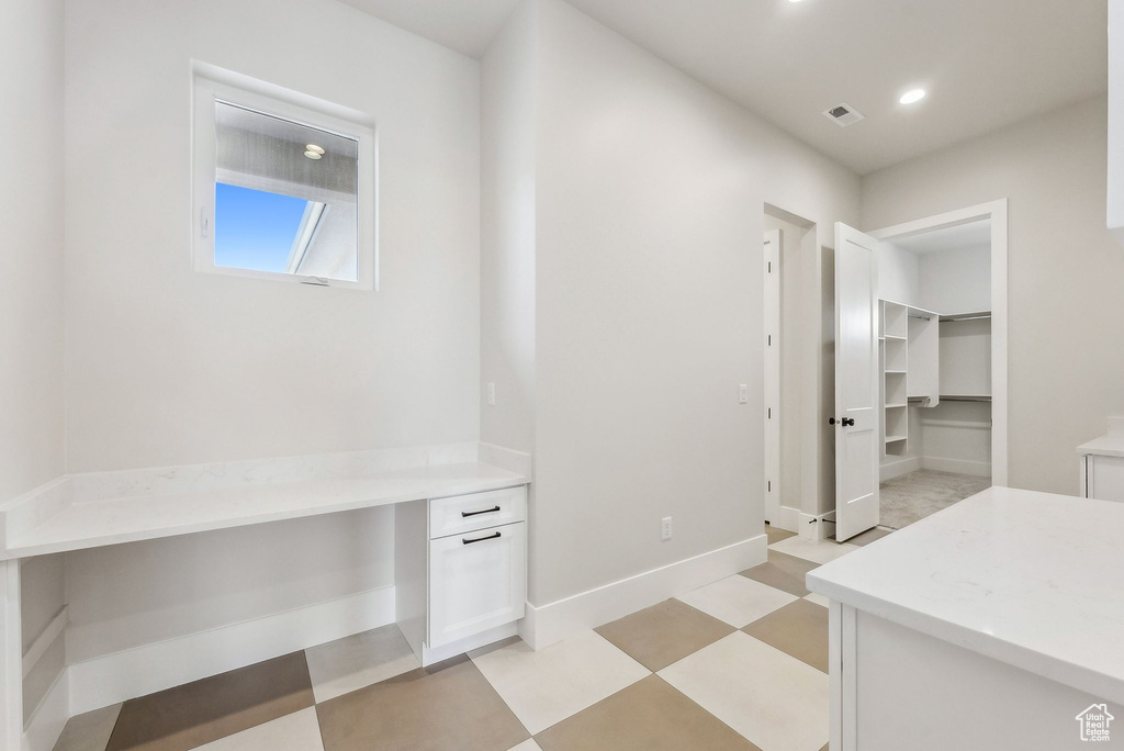 Mudroom with recessed lighting, baseboards, visible vents, and light floors