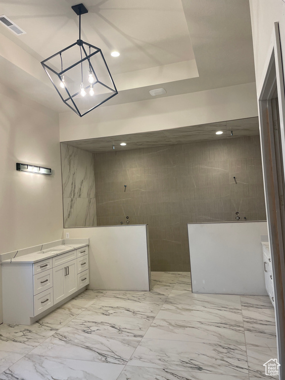 Bathroom with a shower and vanity
