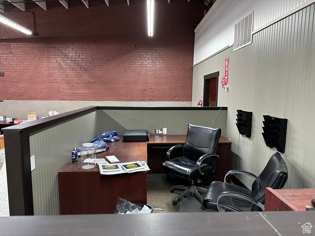 Office space with brick wall