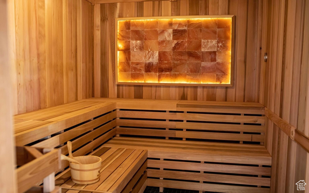 View of sauna featuring wood walls