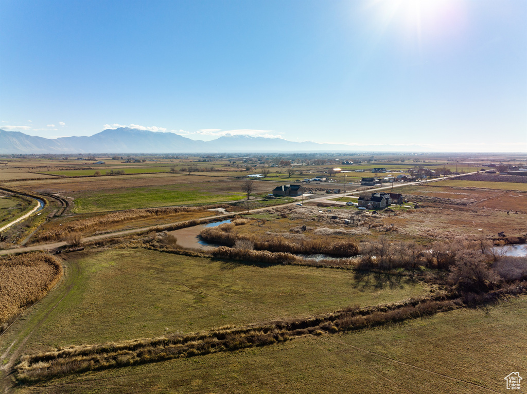 Drone / aerial view with a mountain view and a rural view