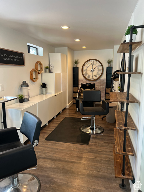 Interior space with dark hardwood / wood-style flooring