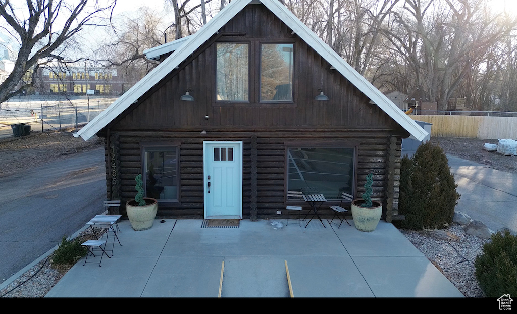 Back of property with a patio area