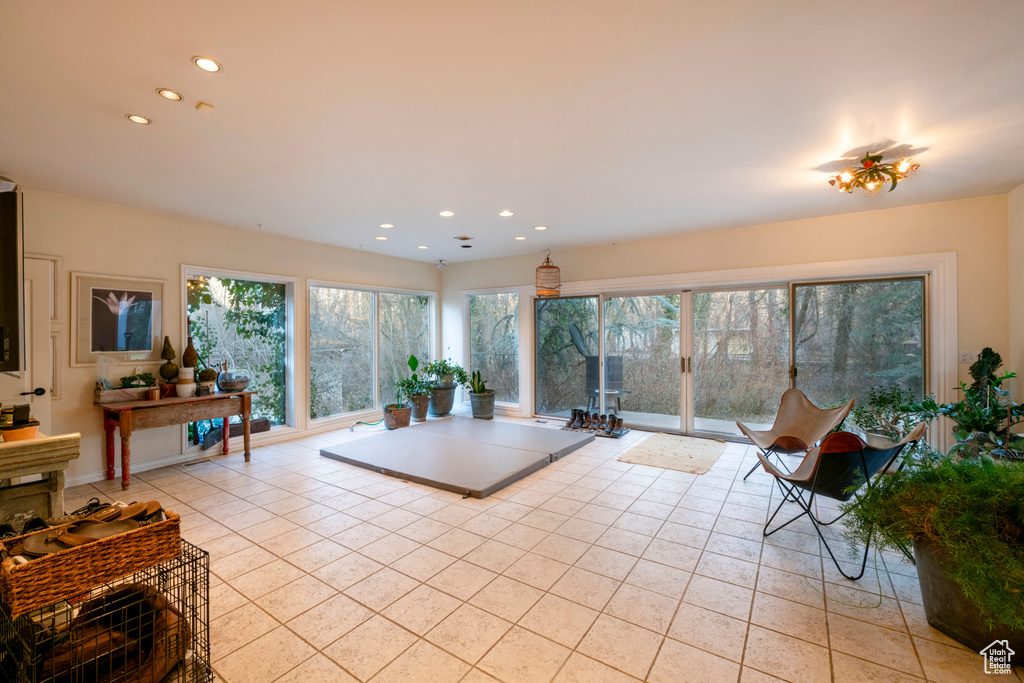Living room featuring light tile floors