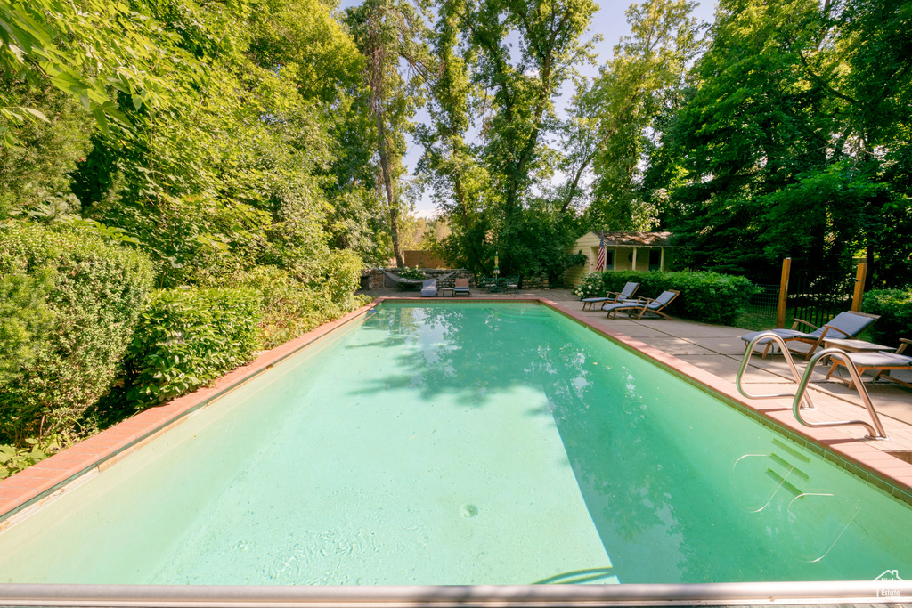 View of pool featuring a patio