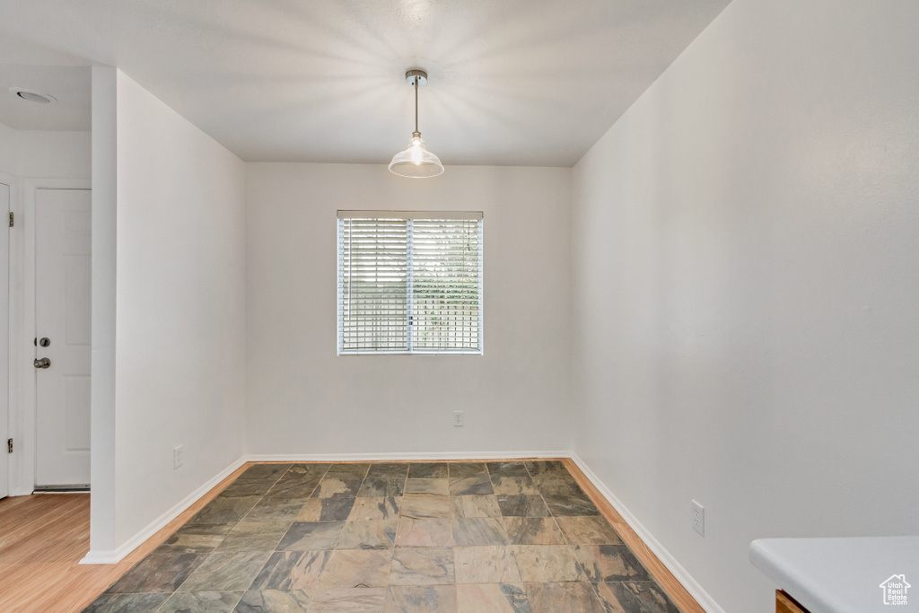 Unfurnished room featuring tile floors