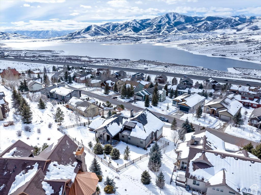 Snowy aerial view with a mountain view