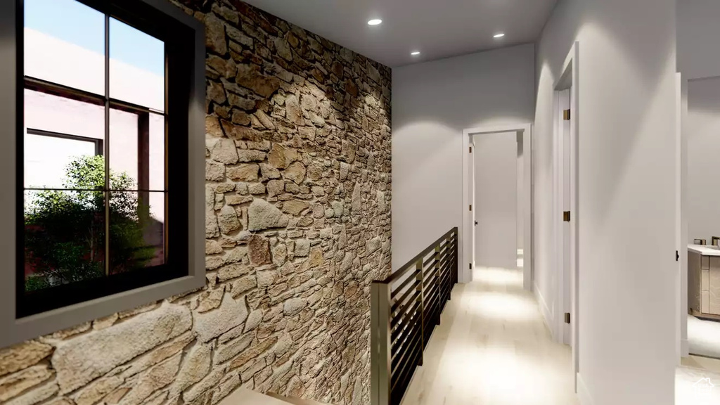 Hallway with light wood-type flooring