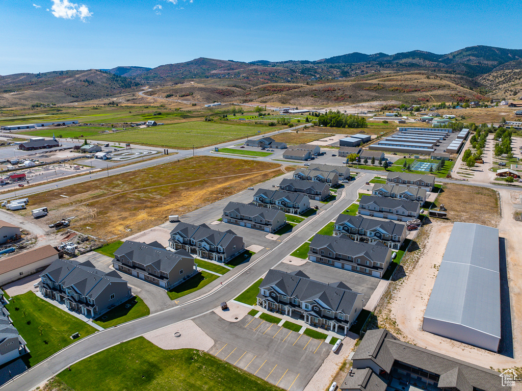 Birds eye view of property with a mountain view